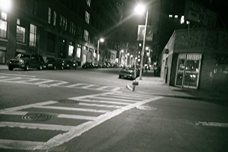 This is right near my office. I was walking home from work one night, and snapped this. A Street deli is on the right.