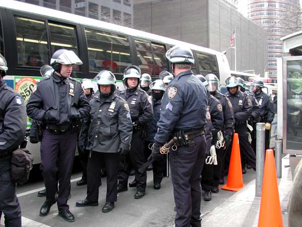 A menacing line of cops.